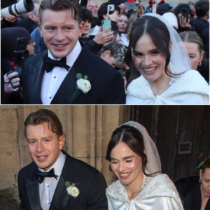 HAPPILY MARRIED… BUT AT A C0ST  Adam Peaty and Holly Ramsay stepped out of the church hand in hand as newlyweds — smiles wide, cameras flashing. But behind the joyful exit lies a painful truth: A wedding that reportedly tore his family apart. A perfect ending… or the start of a deeper divide?